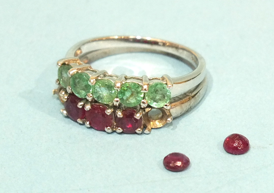 A 9ct white gold ring set five emeralds, N and a similar ring set rubies, (af), O, 3.9g.