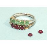 A 9ct white gold ring set five emeralds, N and a similar ring set rubies, (af), O, 3.9g.