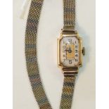 A ladies 9ct-gold-cased wrist watch on tri-coloured 9ct gold mesh bracelet, 13.6g.