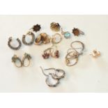 A quantity of earrings, mainly-marked for 9ct gold, some gem-set, total weight 14g.