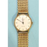 A gentlemans Roamer Quartz wrist watch with 9ct gold case and bracelet, 32mm diameter.