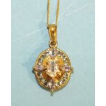 A modern 9ct gold gem-set cluster pendant set tourmalines and tanzanites, on fine curb-link chain,