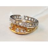 An 18ct yellow gold ring set four old-cut diamonds and a diamond-set eternity ring, (diamonds