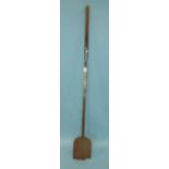 An iron peel of bread oven spatula with short wood handle, 186cm, (af).