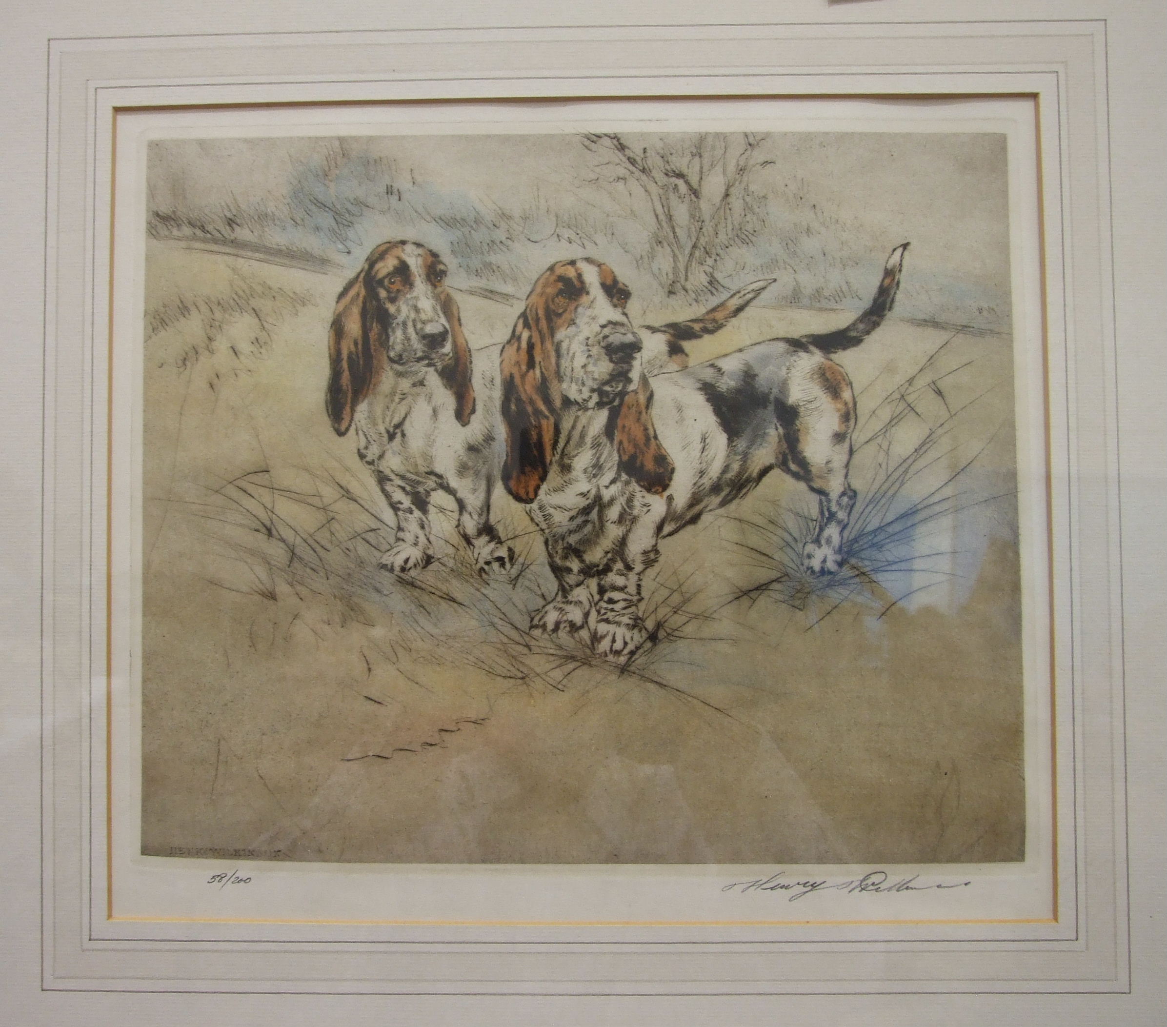 After Henry Wilkinson TWO BASSETT HOUNDS IN A LANDSCAPE Coloured dry point etching, limited