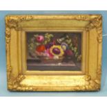 Style of Thomas Steele, a porcelain plaque painted with a basket of flowers resting on a marble