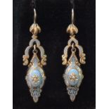 A pair of Victorian pendant earrings c1860, with pearl-set pale blue enamelled drops below enamelled