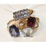 Four 9ct gold gem-set rings by QVC, sizes O½ to P, 13.4g, (4).