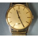 Omega, a gent's wrist watch c1962, the silvered dial with baton numerals and seconds subsidiary, the