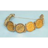 A 9ct gold bracelet of seven half-sovereigns: 1902, 1903, 1910 (2), 1911, 1914 (2), 36.8g.