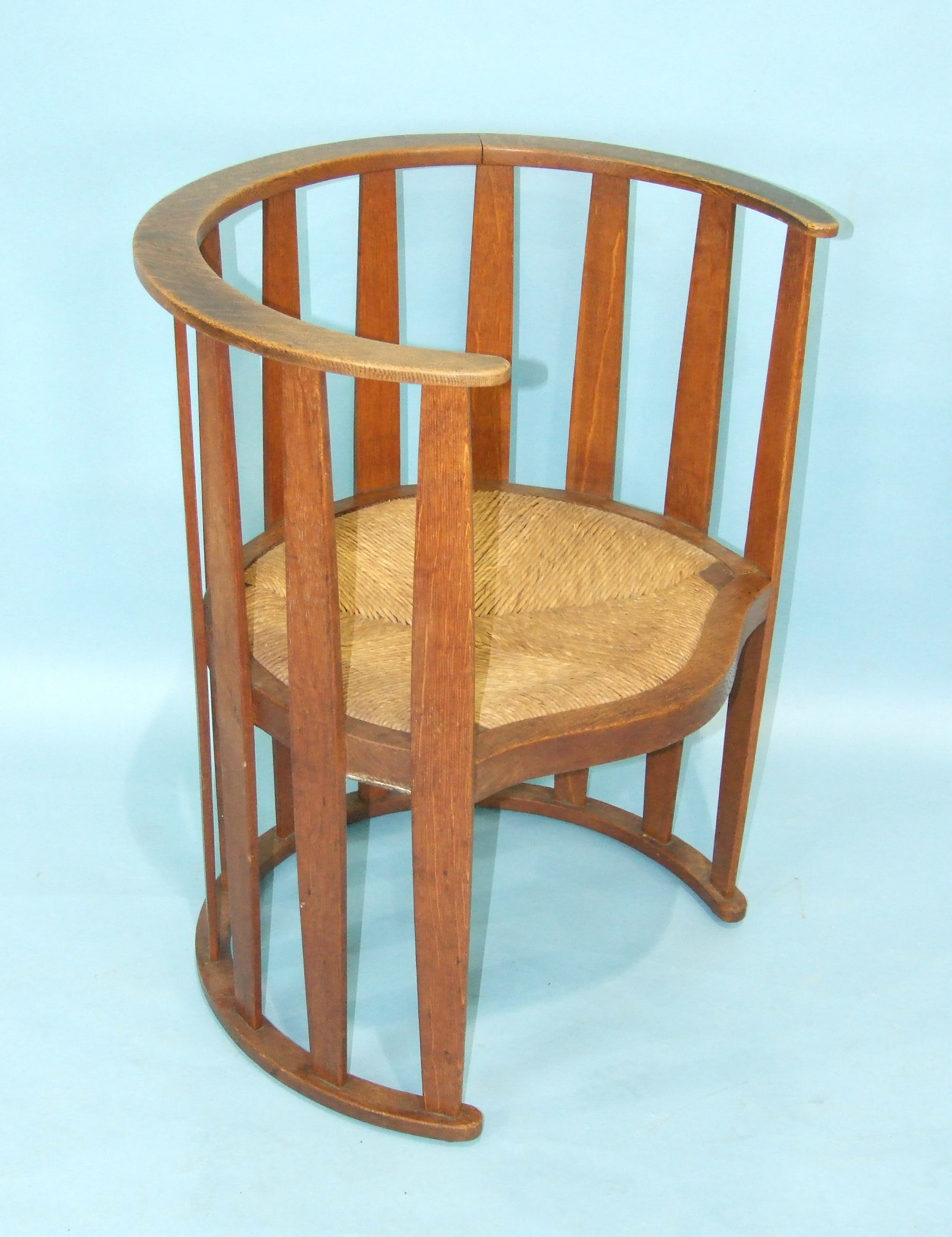 An Arts & Crafts-style oak slatted chair of cylinder shape, with serpentine-fronted drop-in rush - Image 2 of 2