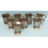 A collection of eight Victorian half-pint pewter frosted tankards with C-scroll handles, 11cm