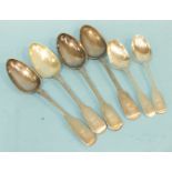 Four Exeter silver fiddle pattern table spoons, 1847, 1850 (3), a dessert spoon, 1837, all makers