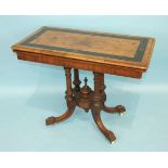 A Victorian walnut fold-over card table with ebony-banded top on turned supports and four swept legs