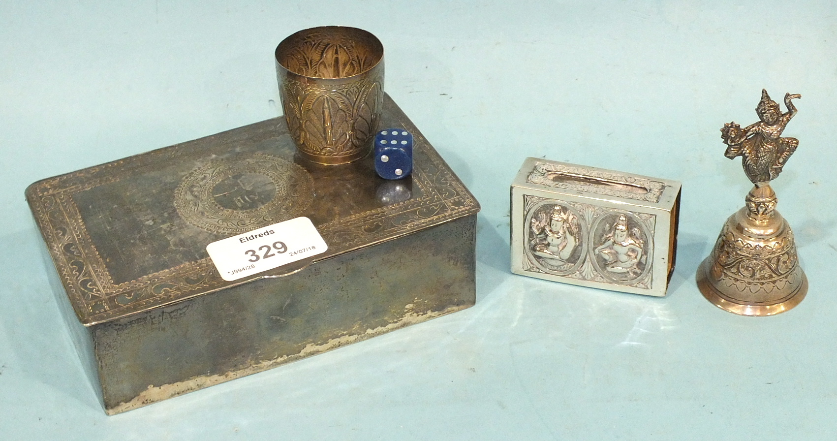 A Middle Eastern white metal cigarette box, 14.5 x 9 x 4cm, a Burmese matchbox holder and other