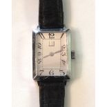 Dunhill, a ladies steel-cased 'Centenary' wrist watch, the silvered dial marked 'Dunhill', with