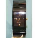 A Titan Regalia gent's quartz dress watch, the square black face, 22mm wide, with black-plated