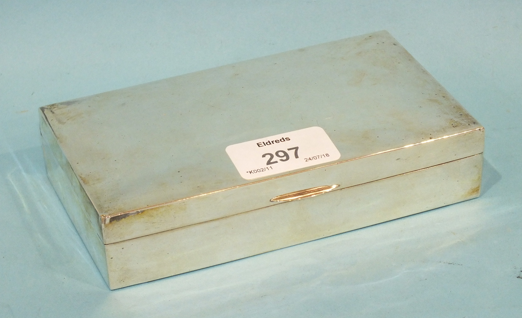 A silver plain rectangular cigarette box, maker S & M, Birmingham 1956, 15 x 8.5 x 3cm.