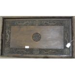 An early 20th century Chinese carved hardwood tray, the centre carved with the Devonshire Regiment