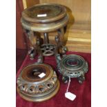 A Chinese carved hardwood jardinière stand, the circular burr wood top, 20cm diameter, on five