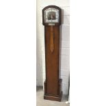 A 1940's Art Deco-style oak case chiming grandmother clock, 138cm high.