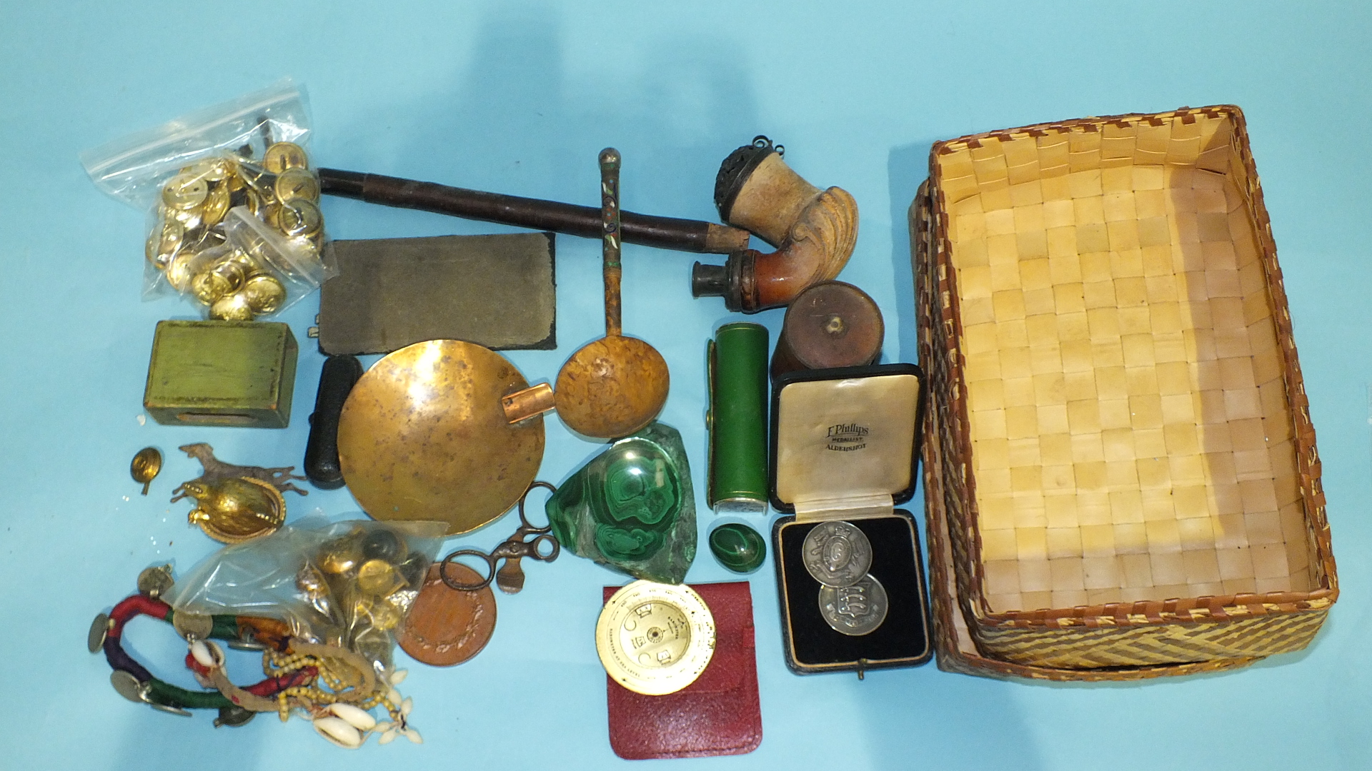 A collection of silver naval buttons, a gold mounted amber cigarette holder, a Meerschaum pipe