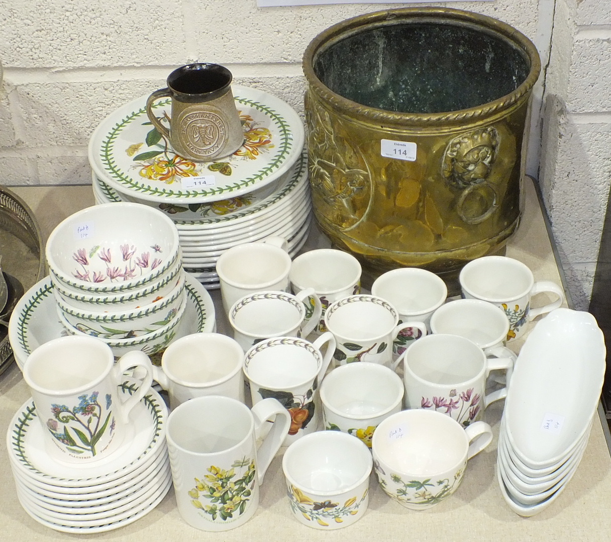 Approximately forty pieces of Portmeirion 'Botanic Garden' tea and dinner ware and a brass