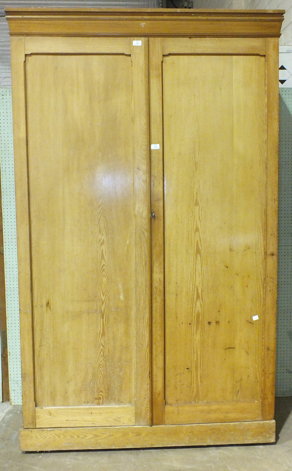 A stained pine two-door wardrobe, 123cm wide, 207cm high. - Image 2 of 2