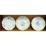 A pair of 19th century English floral painted porcelain plates, 23cm diameter and one other, (3).