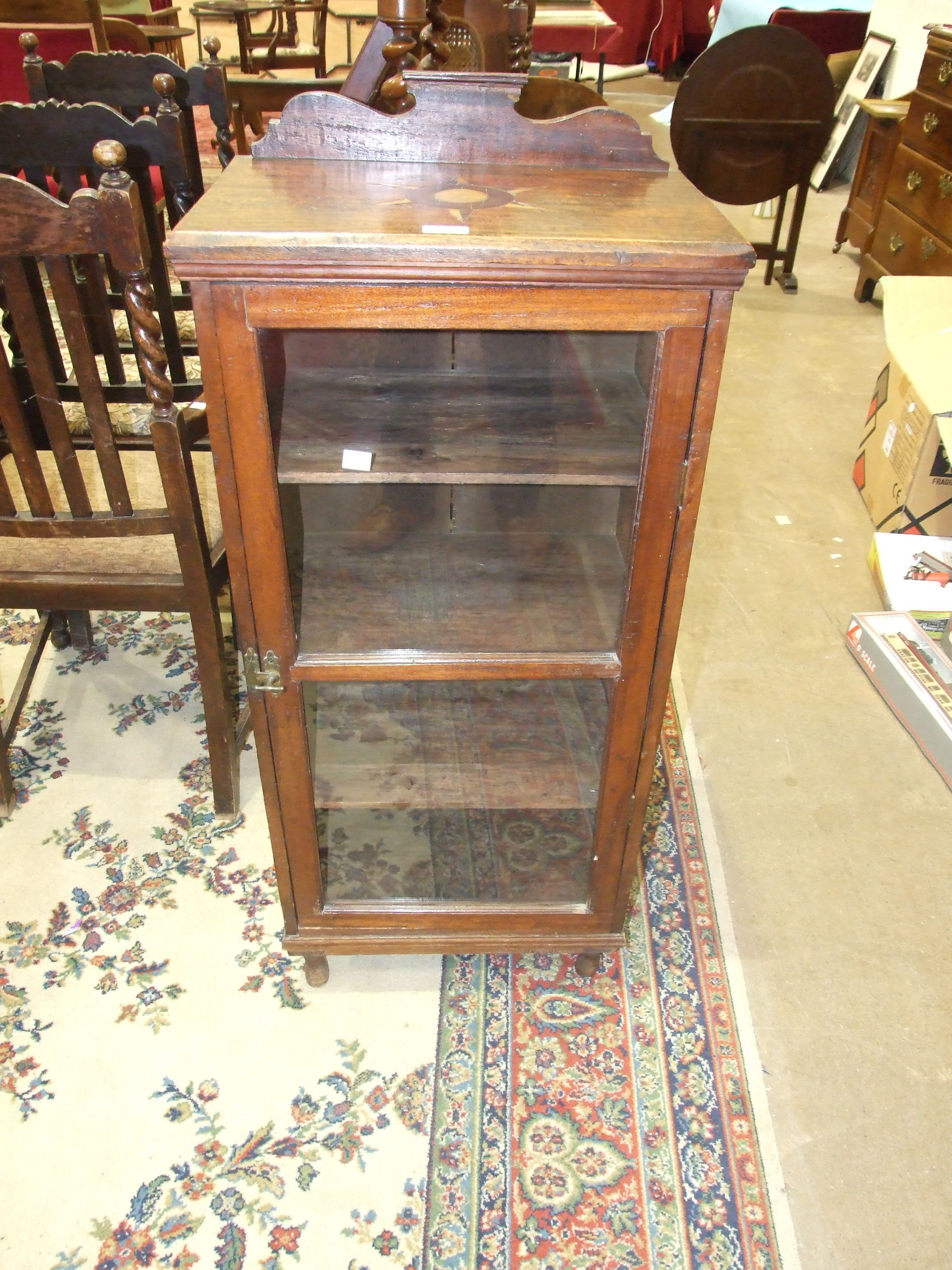 A 19th century pine tool chest, 94cm wide, and a dockyard-made hardwood display cabinet, (2).