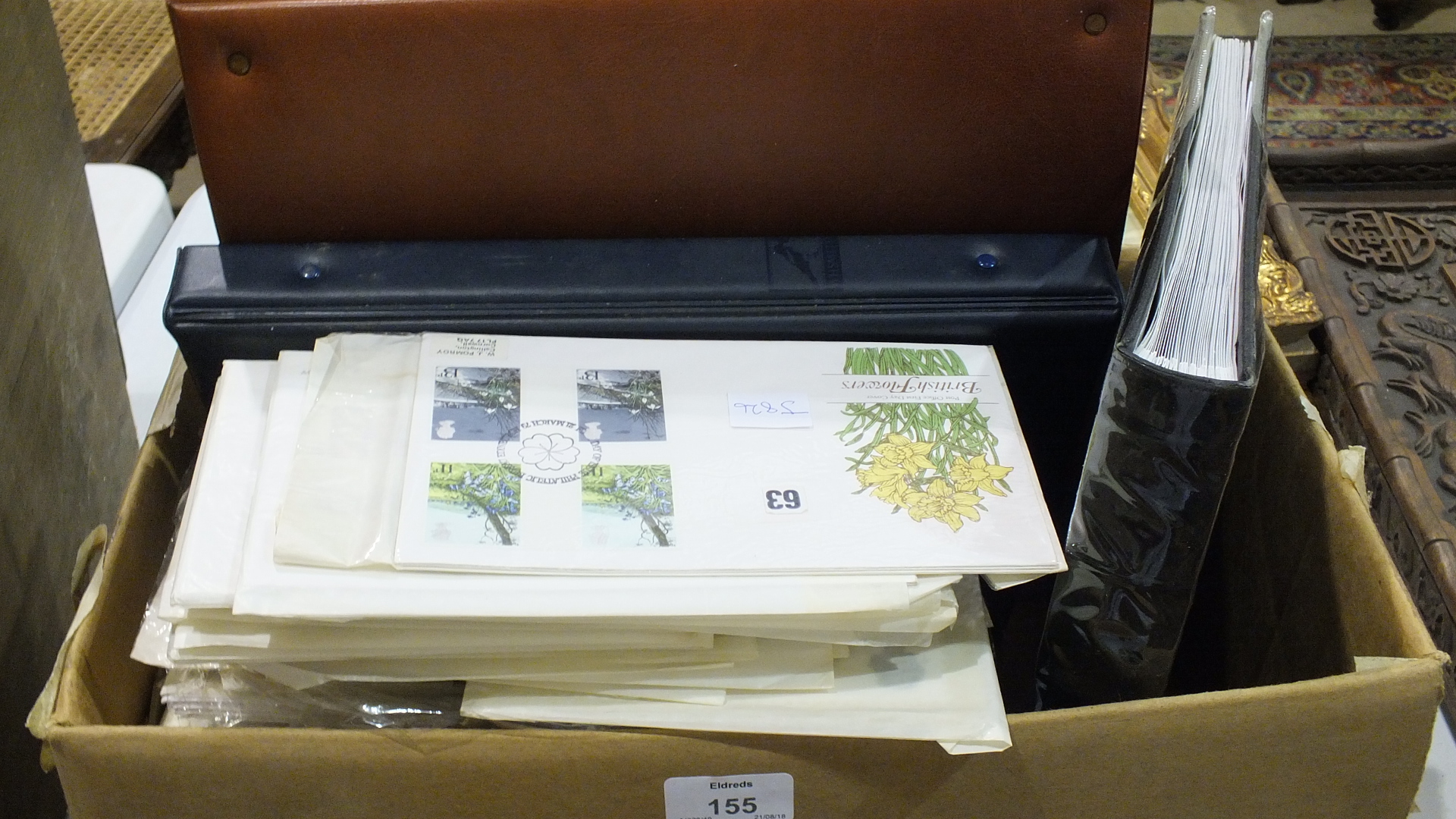 A quantity of first day covers and postal postcards, etc.