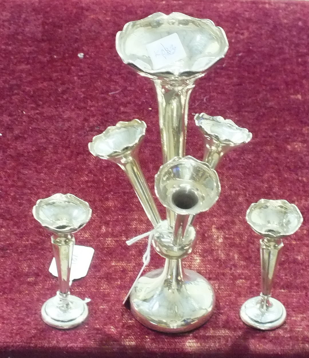 A silver four-branch trumpet shaped epergne on circular loaded base, 25.5cm high, Birmingham 1921