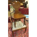 A Victorian mahogany hall chair, the solid back and seat on turned front legs and a Georgian