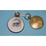 A gold-mounted double-sided locket and an engine-turned locket, (glass missing), (2).