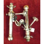 A pair of chromed-brass gimble-mounted candle lamps, converted to electricity, 31cm high.