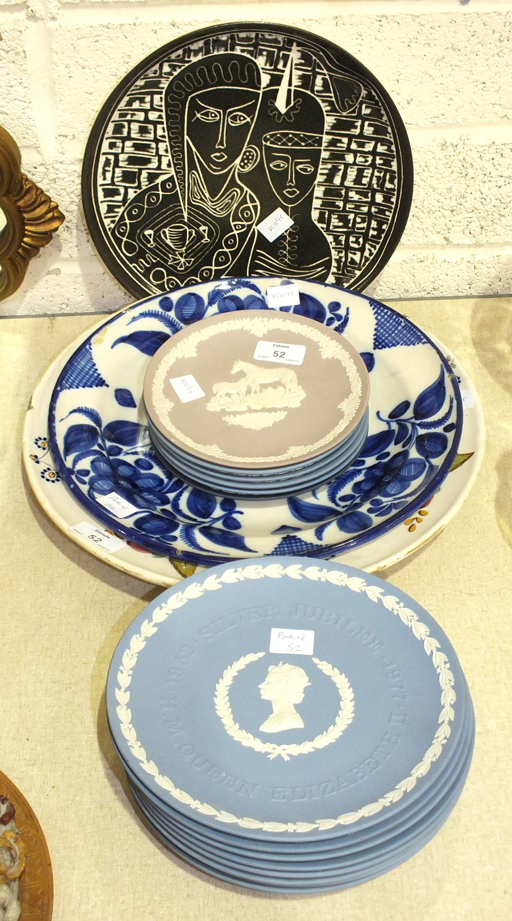 A Faience shallow dish decorated with a horse and flowers, a Tibor Reich 'Rendezvous' plate, etc.