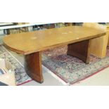 A large mahogany finish boardroom table with rounded ends and supports, 103 x 214cm, together with a