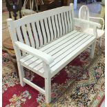 A painted wood slatted garden bench, 141cm wide.