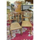 A stained turned wood rocking chair, a mahogany hall chair and a pair of cane-seated bedroom chairs,