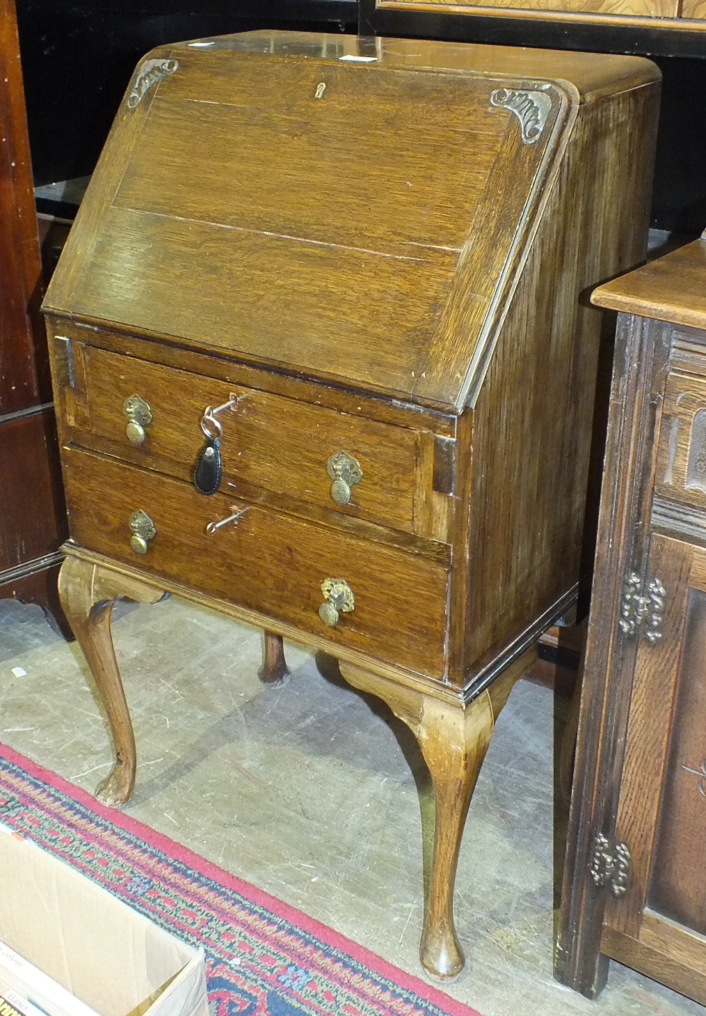 An oak hall seat with hinged seat, 55cm wide, 118cm high, (a/f), a small oak bureau on cabriole - Image 3 of 3