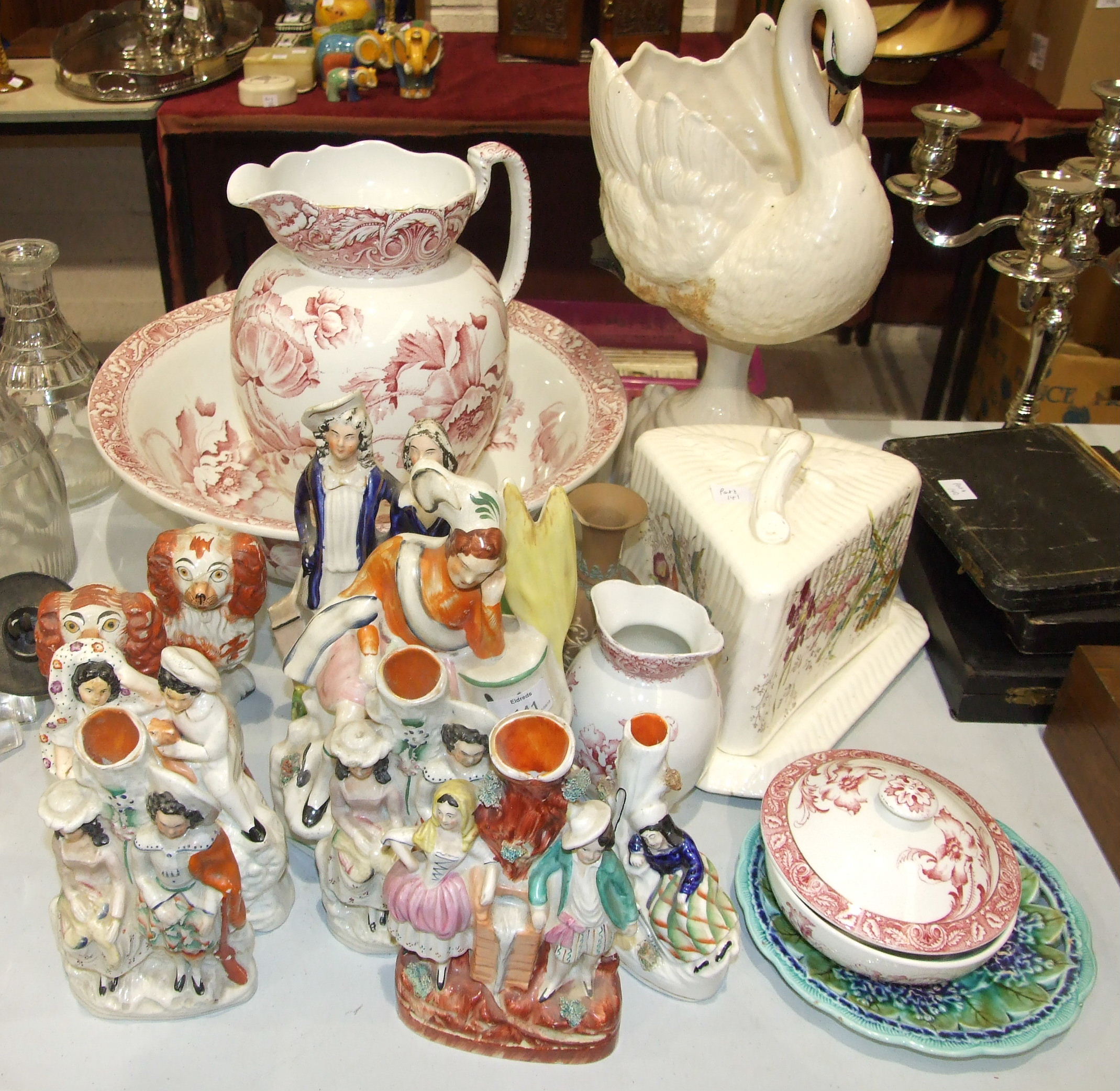 A Grimwades 'Poppea' decorated toilet jug, basin, soap dish and toothbrush holder, a late-19th