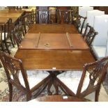 A set of eight reproduction mahogany finish Chippendale-style dining chairs with drop-in seats, on