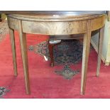 A Georgian mahogany fold-over tea table on square tapering legs, 92cm wide.