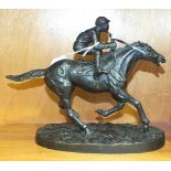 After Menet, 'Jockey and Horse', a 'bronze' figure on oval base, 21cm high.