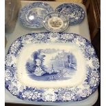 A 19th century blue and white transfer-printed joint dish decorated with a palace and lake scene,