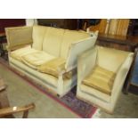A 20th century three-seater Knole settee, with gold-coloured upholstery and braiding and with