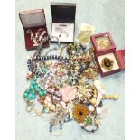 A quantity of costume jewellery, ladies wrist watches and a wooden jewellery box.