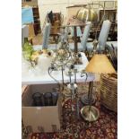 A brass hanging oil lamp, 64cm high, (a/f), an oak table lamp, other light fittings, glassware,