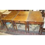 Three 19th century mahogany drop-leaf tables on turned legs, forming a dining table, each section 99