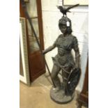 A large spelter and metal figure of Boadicea carrying a spear and shield surmounted by a crow, 124cm